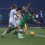 USA's Tobin Heath explaining gravity to Ireland's Aine O'Gorman.