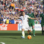 Alex Morgan lines up a shot.