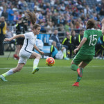 Kelley O'Hara (5) against Katie McCabe (15).