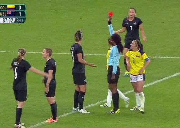 New Zealand's Abby Erceg is shown a red card agains Colombia.