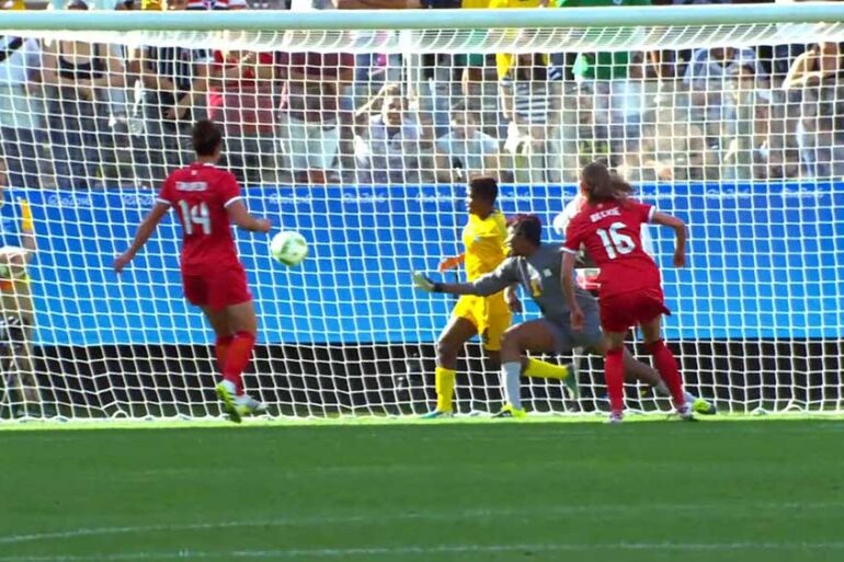 Canada's Janine Beckie scores against Zimbabwe.