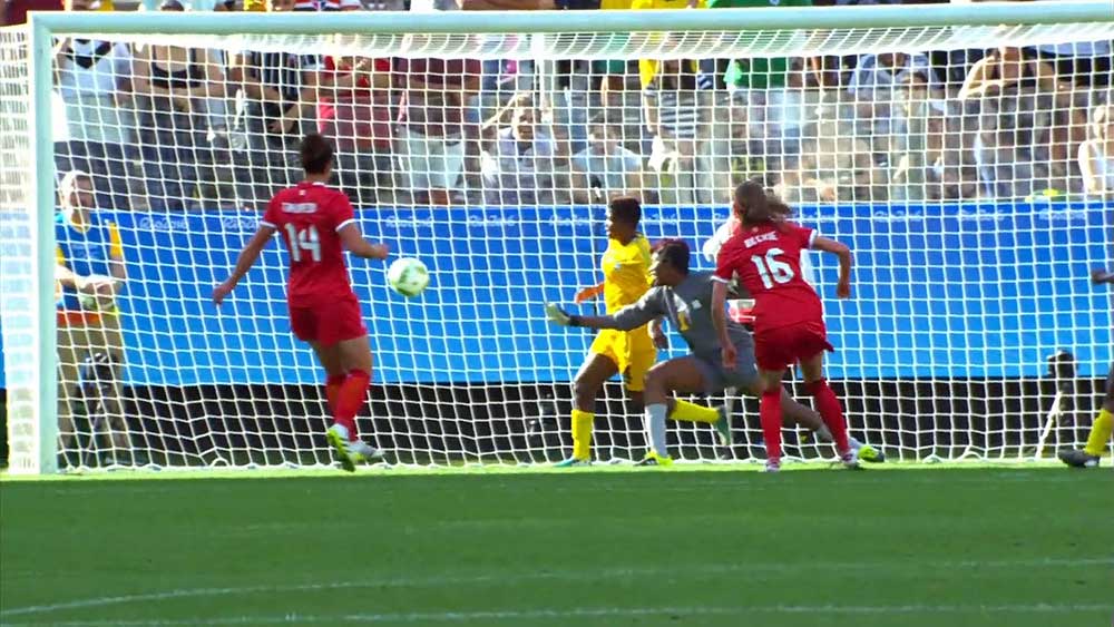 Canada's Janine Beckie scores against Zimbabwe.