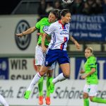 Sara Björk Gunnarsdóttir (WOB) and Dzsenifer Marozsán (OL) on takeoff.