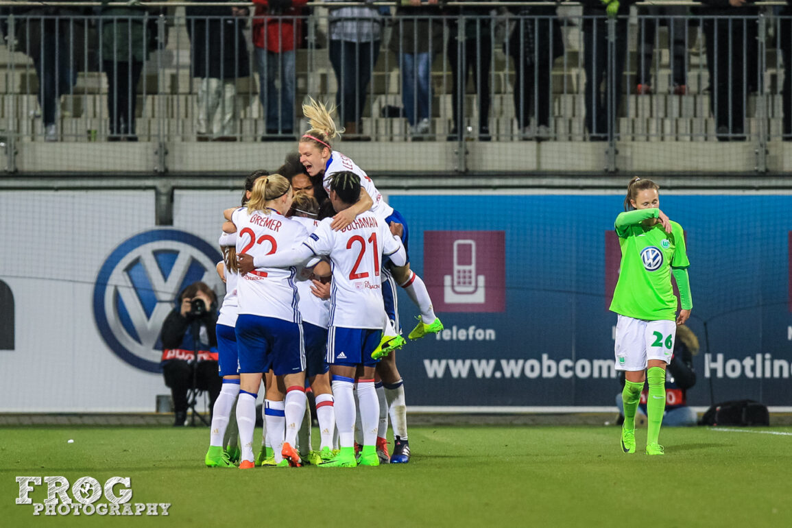 OL celebrates Camille Abily's goal. Le Sommer gets air.