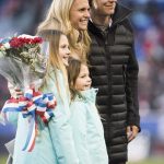 Christie Rampone with her daughters and Abby Wambach during a pregame ceremony honoring Rampone for her USWNT career.