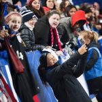 Mallory Pugh taking selfies with fans after a 2017 SheBelieves Cup match.