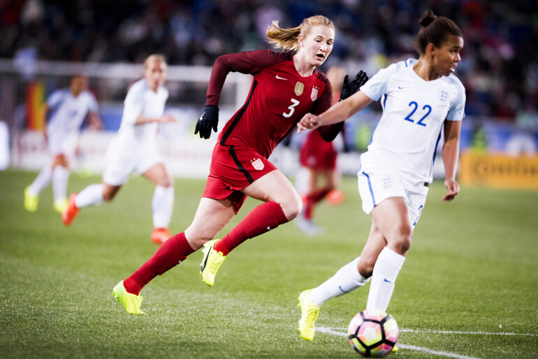 USA's Sam Mewis and England's Nikita Parris.