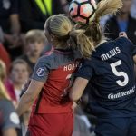 Lindsey Horan and Sam Mewis vie for the ball (Shane Lardinois).