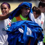 Everyone heldps out. Sydney Leroux and Catherine Parkhill before the game. (Shane Lardinois)