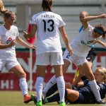 Makenzy Doniak challenges Shea Groom for the ball. (Shane Lardinois)