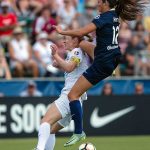 Ashley Hatch, uh, misjudges a challenges on Becky Sauerbrunn. (Shane Lardinois)