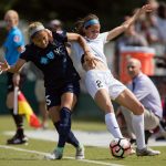 Jaelene Hinkle and Shea Groom battle for the ball. (Shane Lardinois)