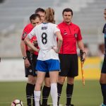 Pregame coin toss and already Abby Erceg is having none of it. (Shane Lardinois)