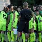 Seattle Reign FC huddle. (Shane Lardinois)