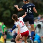 Ashley Hatch rises for the header. (Shane Lardinois)