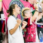 Tobin Heath celebrating with the Thorns fans after winning the 2017 NWSL Championship. (Monica Simoes)