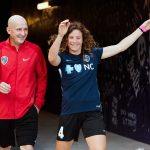Paul Riley, head coach of the North Carolina Courage, and Elizabeth Eddy walking out for pregame warm-ups at the 2017 NWSL Championship. (Monica Simoes)