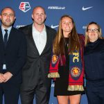 EJ Proctor with Utah Royals head coach Laura Harvey and staff (Monica Simoes).