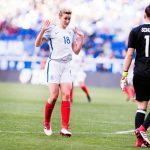 England's Ellen White says hello to Germany's Almuth Schult. (Monica Simoes)