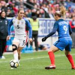 USA's Kelley O'Hara takes on France's Eugénie Le Sommer during the 2018 SheBelieves Cup. (Monica Simoes)