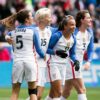 Kelley O'Hara, Megan Rapinoe, and Andi Sullivan celebrate Mallory Pugh's goal (11) during the 2018 SheBelieves Cup. (Monica Simoes)