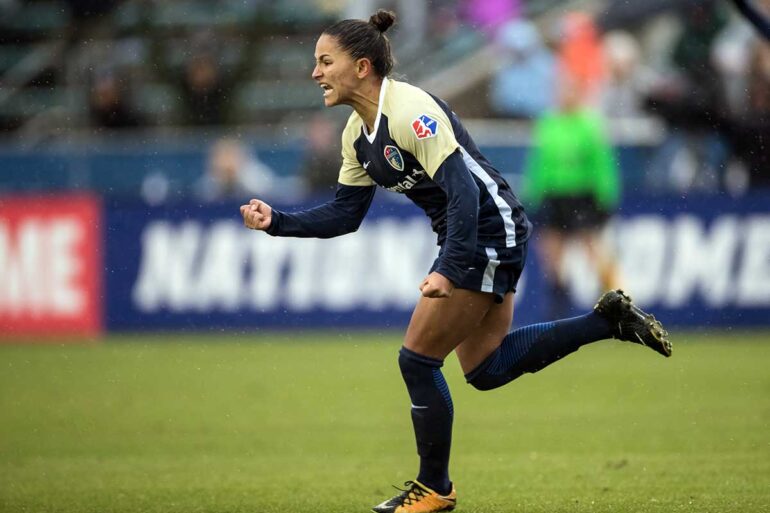 Debinha celebrates after scoring. (Shane Lardinois)