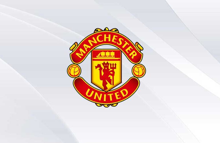 Manchester United logo on white background.