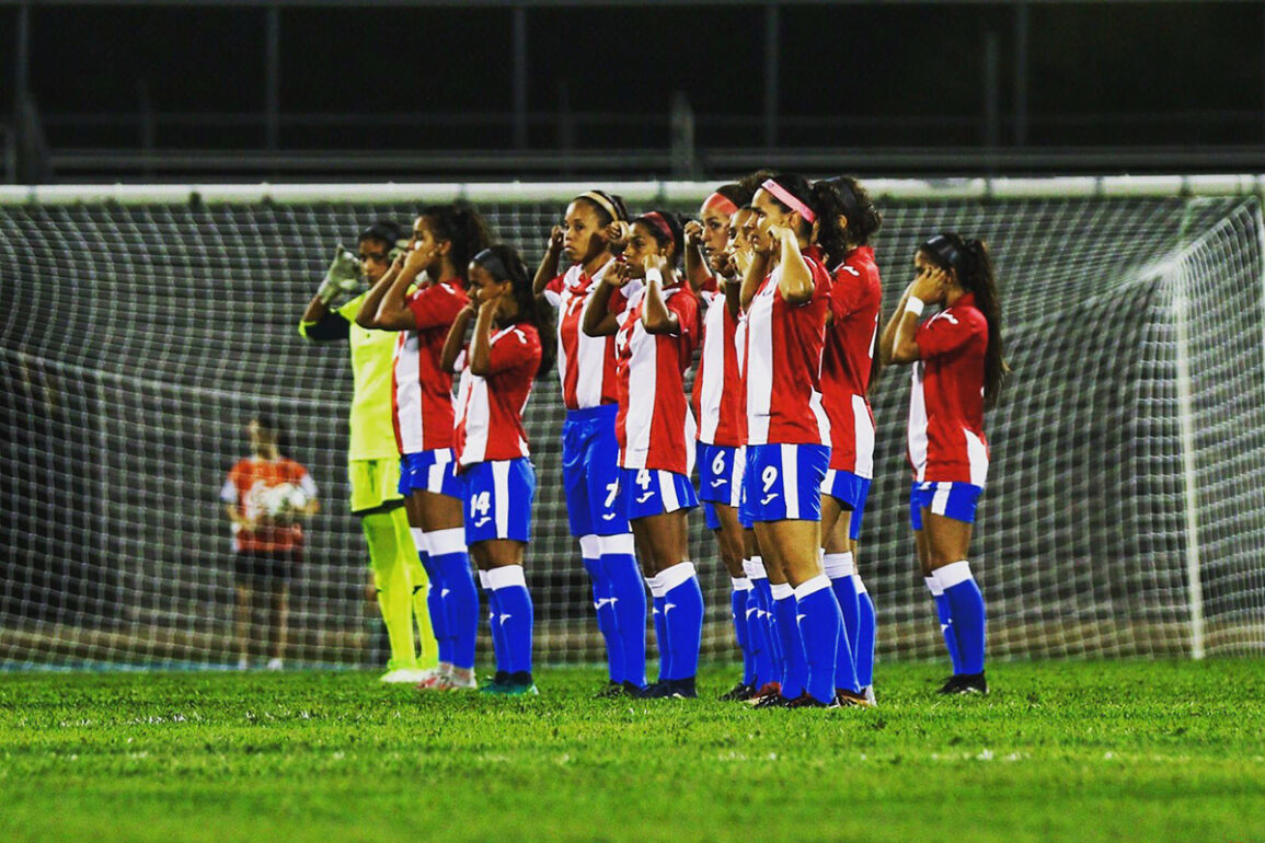 Members of the Puerto Rico Women's National Team silently protest against subpar treatment during a friendly against Argentina. (Nicole Rodriguez)
