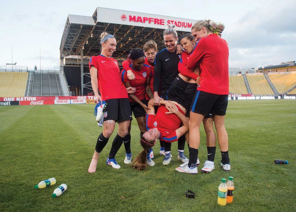 Members of the U.S. WNT playing around after practice. Full version. (Brad Smith / ISI)