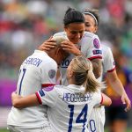 Shanice van de Sanden, Dzsenifer Marozsán, and Ada Hegerberg celebrate during the 2019 UEFA Women's Champions League final. (Daniela Porcelli / OGM)