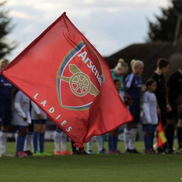 Arsenal flag before the game (joshhdss, Wiki Commons).