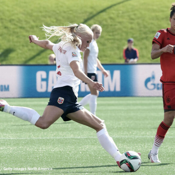 Norway's Maria Thorisdottir takes on Germany's Celia Sasic. (Andre Ringuette / Getty Images North America)