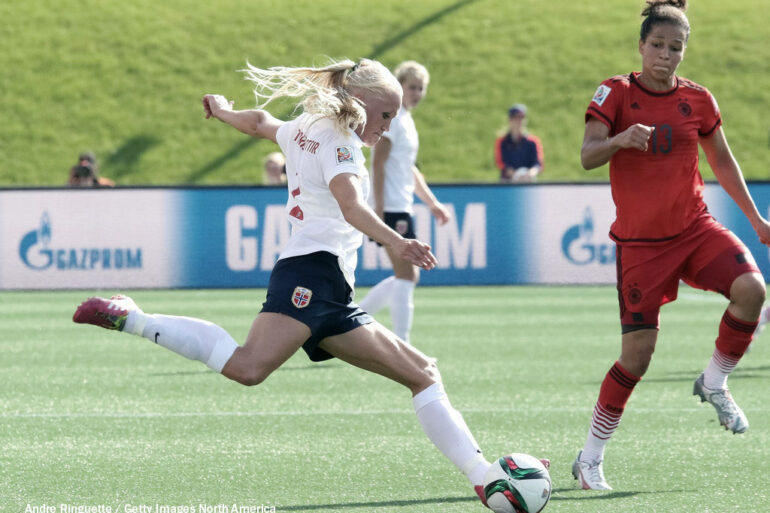 Norway's Maria Thorisdottir takes on Germany's Celia Sasic. (Andre Ringuette / Getty Images North America)