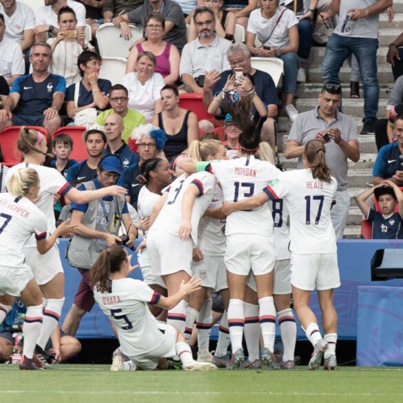 The USWNT celebrates after scoring against France in the 2019 World Cup. (Manette Gonzales)