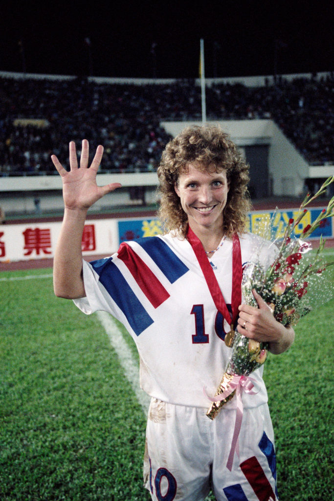 Michelle Akers after winning the first Women's World Cup with the U.S. Women's National Team. (Gilbert Iundt / Corbis Images)