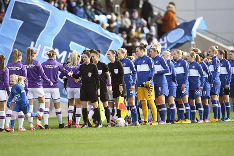 Manchester City and Chelsea players shake hands before kickoff. (The FA)