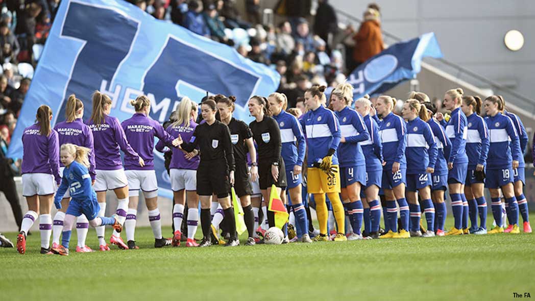 Manchester City and Chelsea players shake hands before kickoff. (The FA)