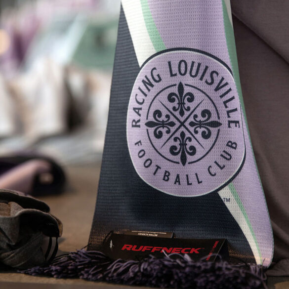 Close-up color image of Racing Louisville FC scarf. (EM Dash Photography / Racing Louisville FC)