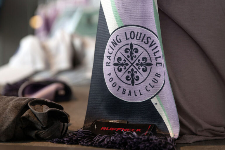 Close-up color image of Racing Louisville FC scarf. (EM Dash Photography / Racing Louisville FC)