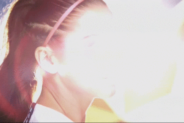 Alex Morgan staring at the camera in a U.S. Women's National Team promo spot in .gif format.