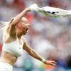 England's Chloe Kelly celebrates scoring the game-winning goal against Germany in extra time of the UEFA Women's Euro 2022 final. (Lynn Cameron / The FA / Getty Images)