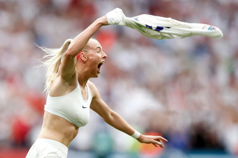 England's Chloe Kelly celebrates scoring the game-winning goal against Germany in extra time of the UEFA Women's Euro 2022 final. (Lynn Cameron / The FA / Getty Images)